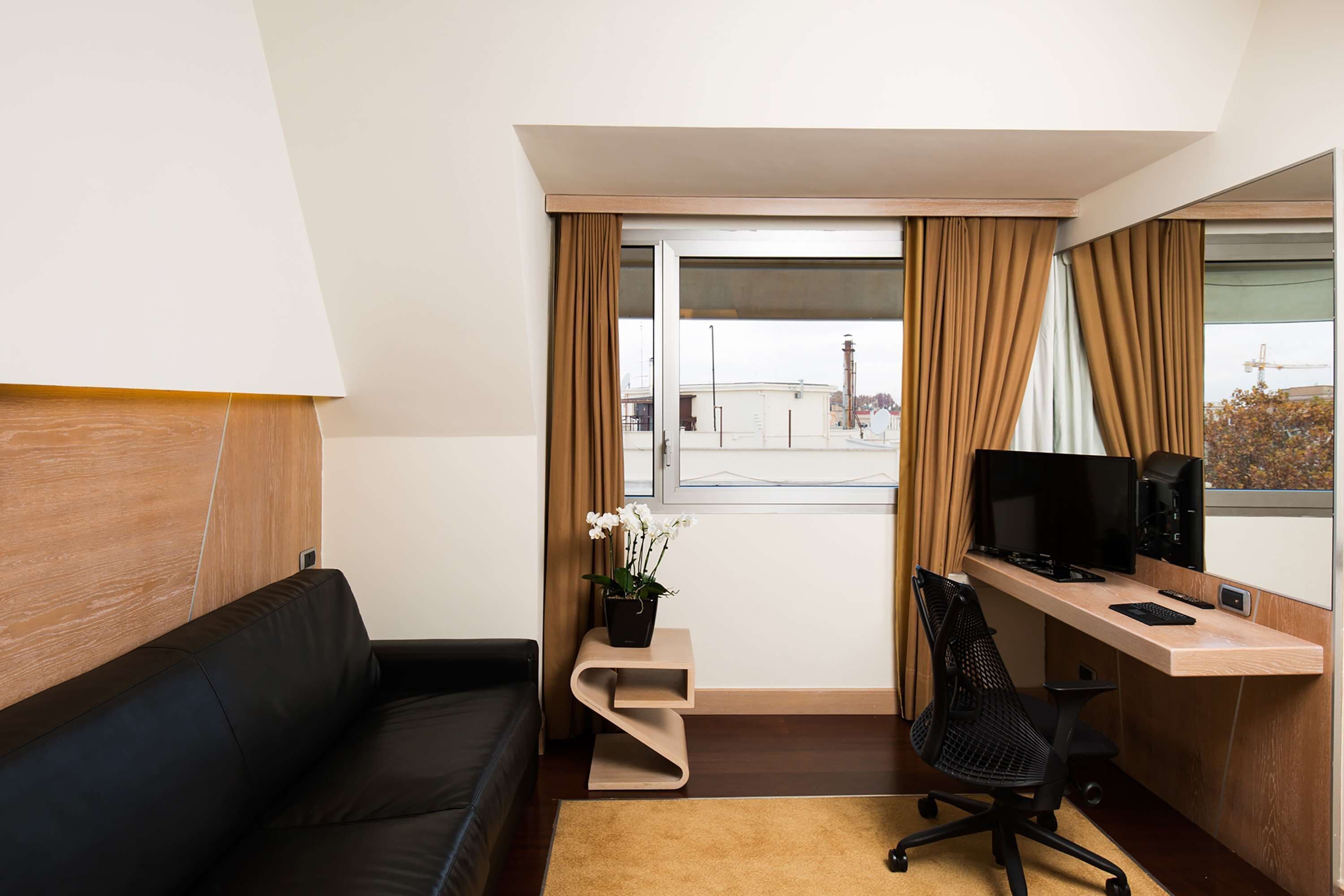 junior suite, 1 king bed | premium bedding, minibar, in-room safe, desk