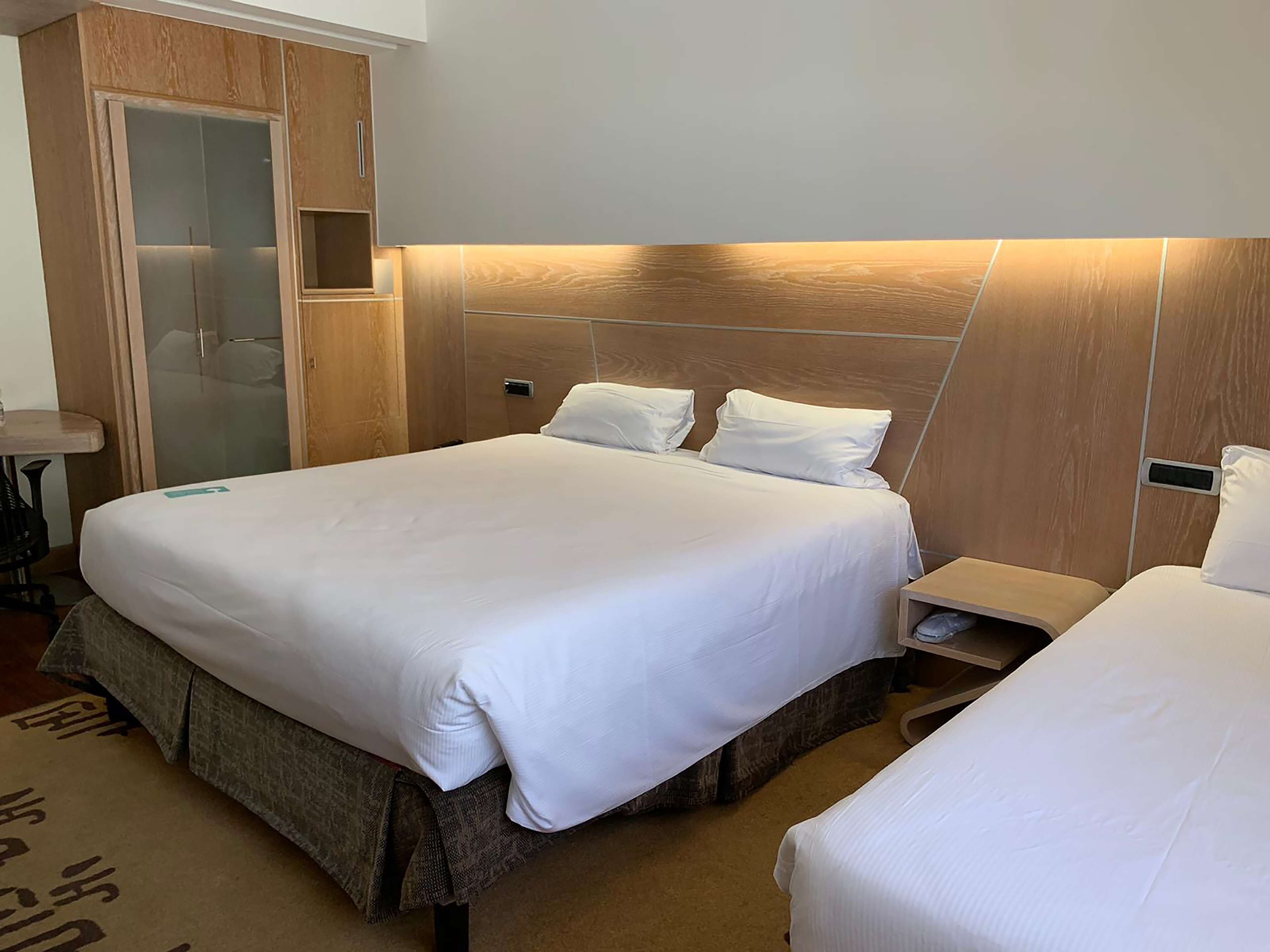 family room, 1 king bed | premium bedding, minibar, in-room safe, desk