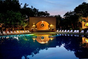 Outdoor pool, open 8:00 AM to 7:00 PM, pool umbrellas, pool loungers