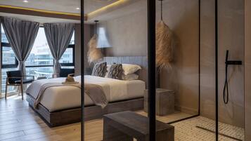 Habitat de O:live | Ropa de cama de alta calidad, edredón, camas con pillow-top y minibar