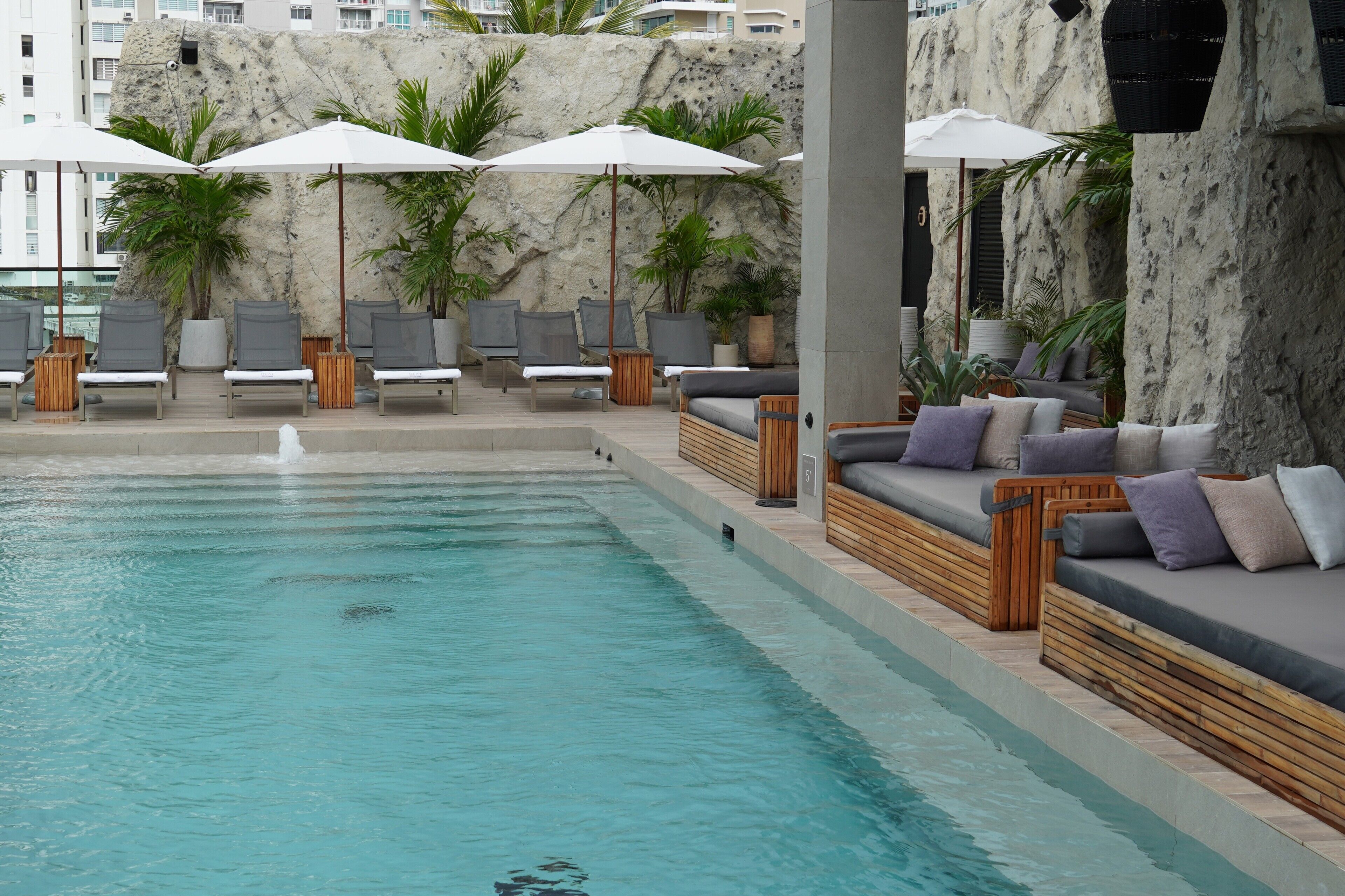 outdoor pool, pool umbrellas, pool loungers