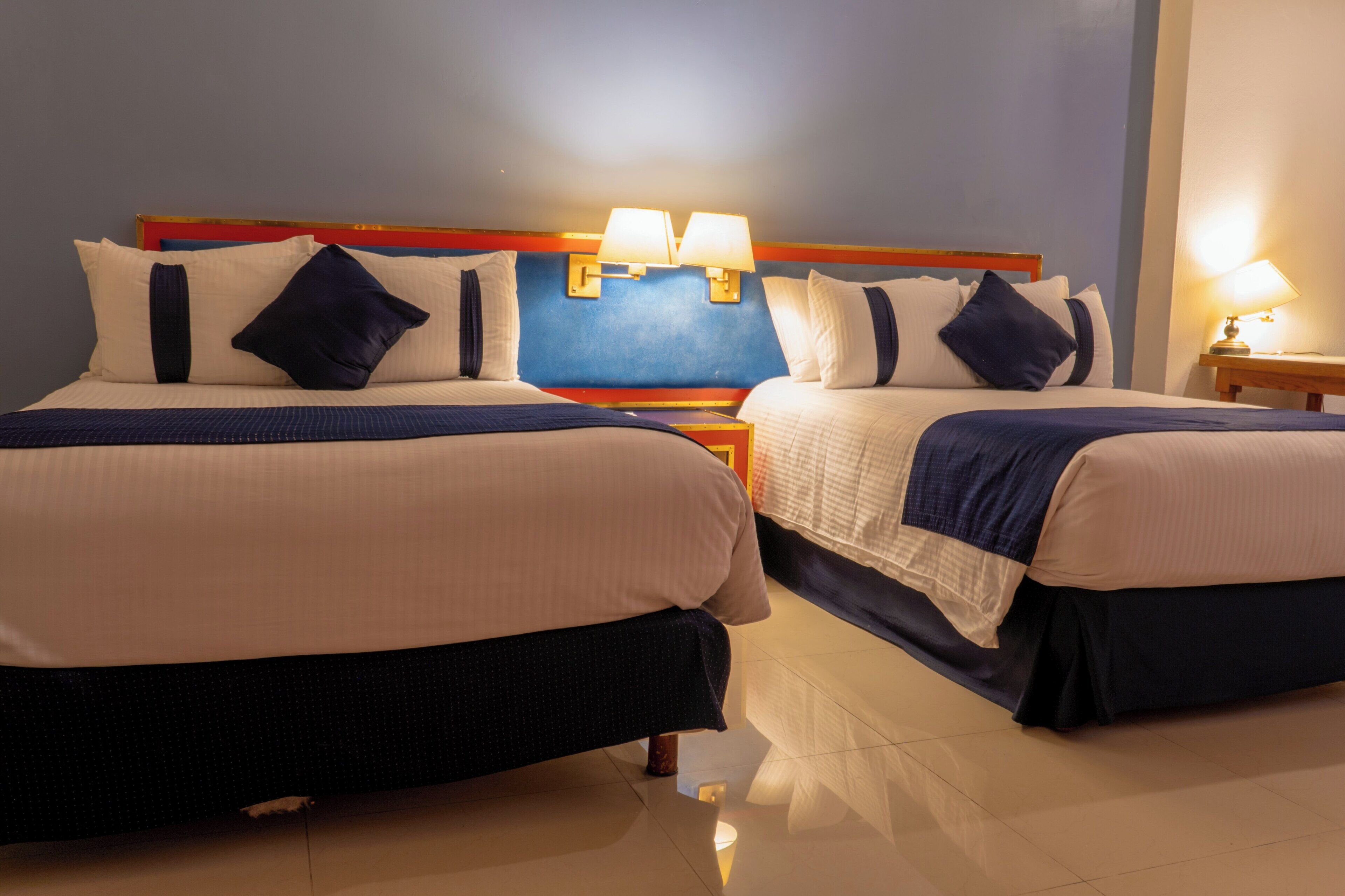 Room, 2 Double Beds (Preferencial) | Iron/ironing board, free WiFi, bed sheets, alarm clocks