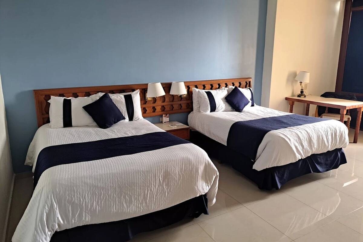 Room, 2 Double Beds (Preferencial) | Iron/ironing board, WiFi (free), alarm clocks, bed sheets