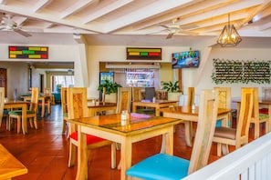 Breakfast, lunch, dinner served; Indian cuisine, pool views