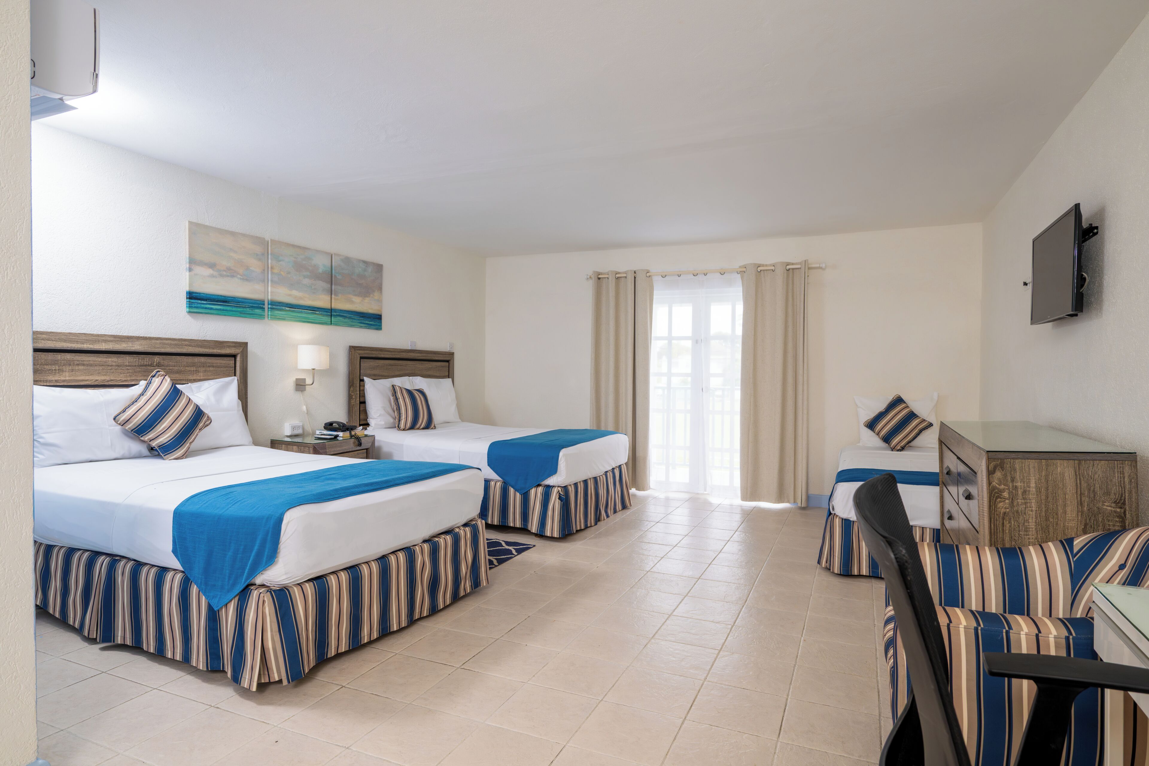 Deluxe Room, Multiple Beds | In-room safe, desk, iron/ironing board, cribs/infant beds