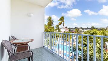 Room, Pool View (2 Double Beds) | Balcony view