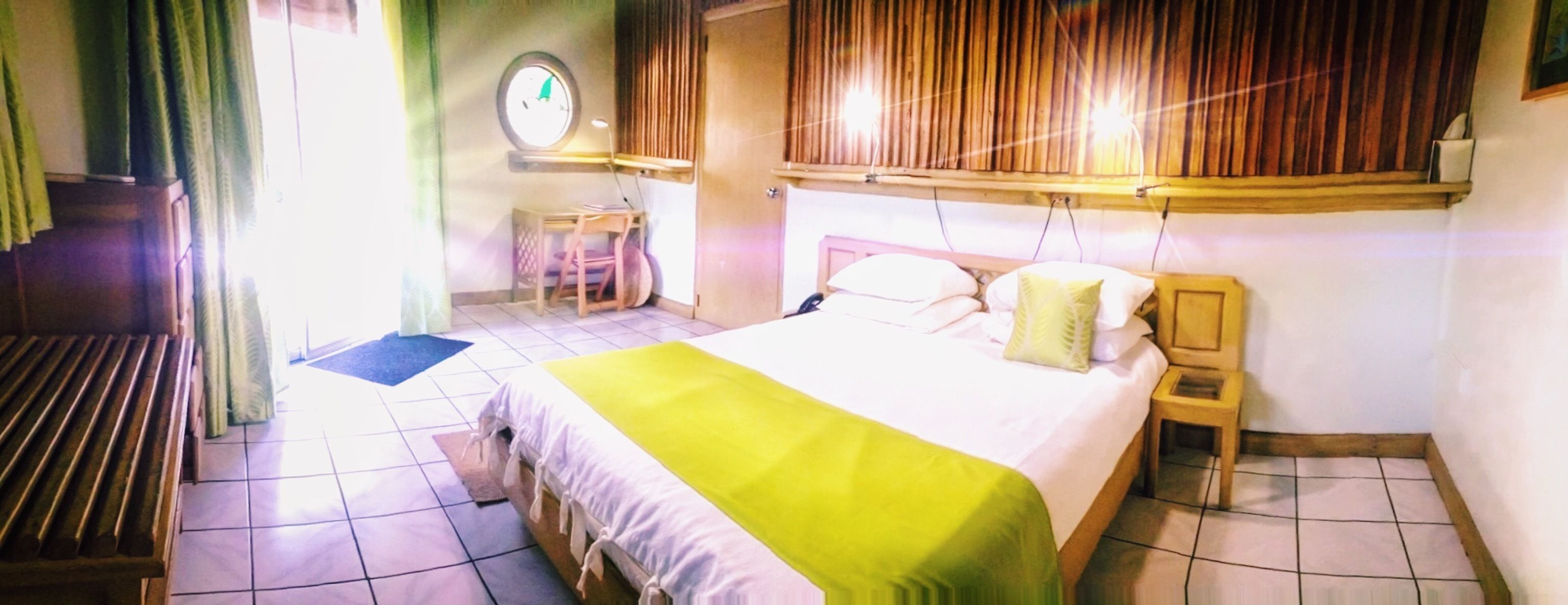 cottage, patio, pool view | in-room safe, desk, iron/ironing board, free wifi