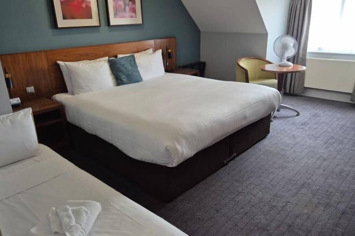 Desk, iron/ironing board, WiFi (free), bed sheets
