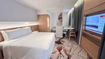 Copriletto in piuma, materassi a doppio strato, minibar