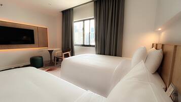 Merdeka Twin with View | Edredón, camas con pillow-top y minibar