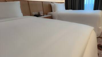 Merdeka Twin with View | Down duvets, pillow-top beds, minibar, in-room safe