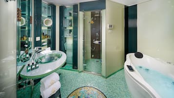 Combined shower/tub, free toiletries, hair dryer, bathrobes