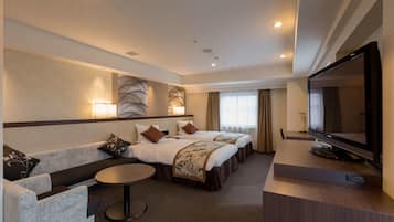 Deluxe Twin Room with Extra Bed - Non-Smoking | In-room safe, desk, free WiFi, bed sheets