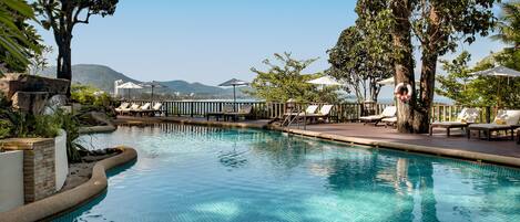 2 outdoor pools, open 8:00 AM to 7:00 PM, pool umbrellas, sun loungers