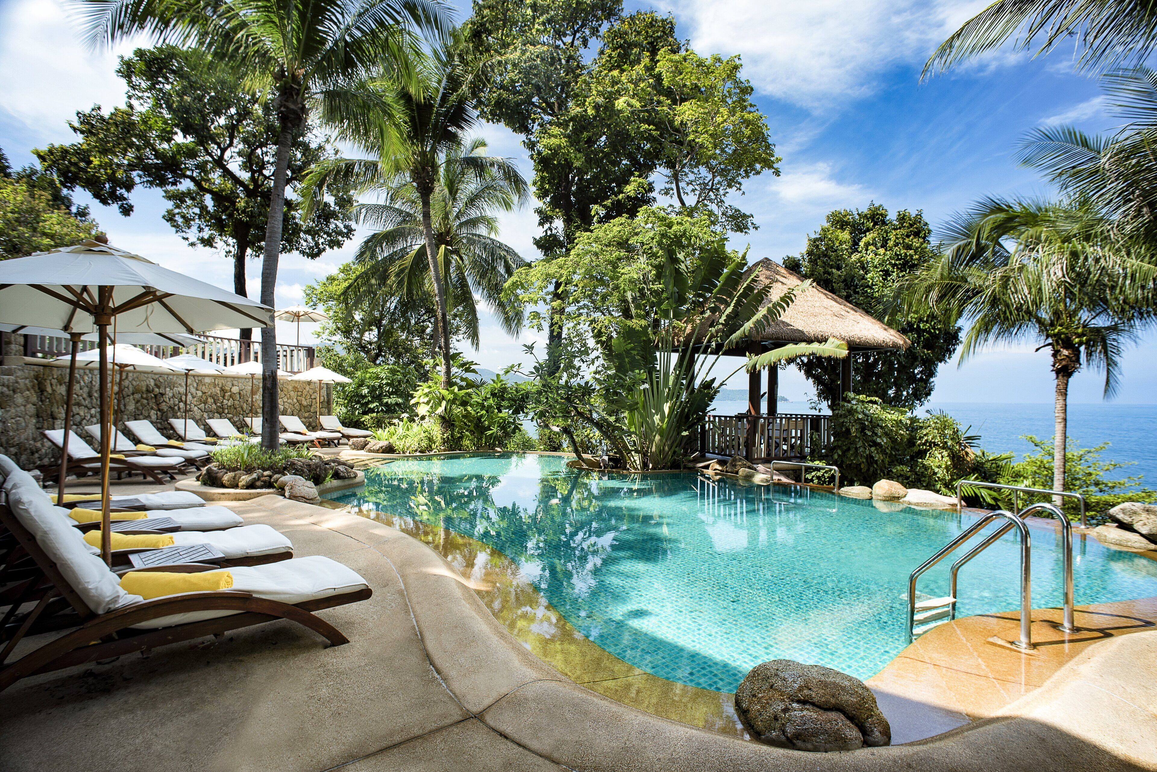 2 outdoor pools, open 8:00 AM to 7:00 PM, pool umbrellas, pool loungers