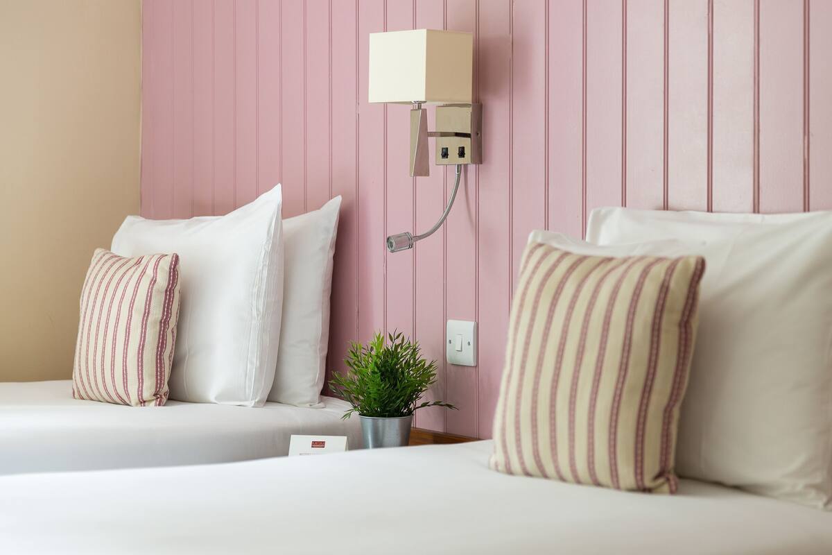 Desk, free WiFi, bed sheets, alarm clocks