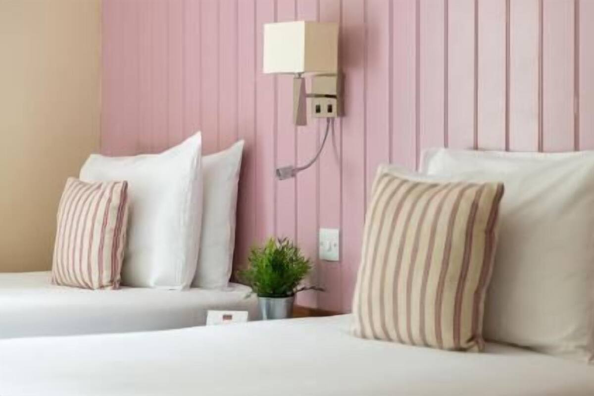 Desk, free WiFi, bed sheets, alarm clocks