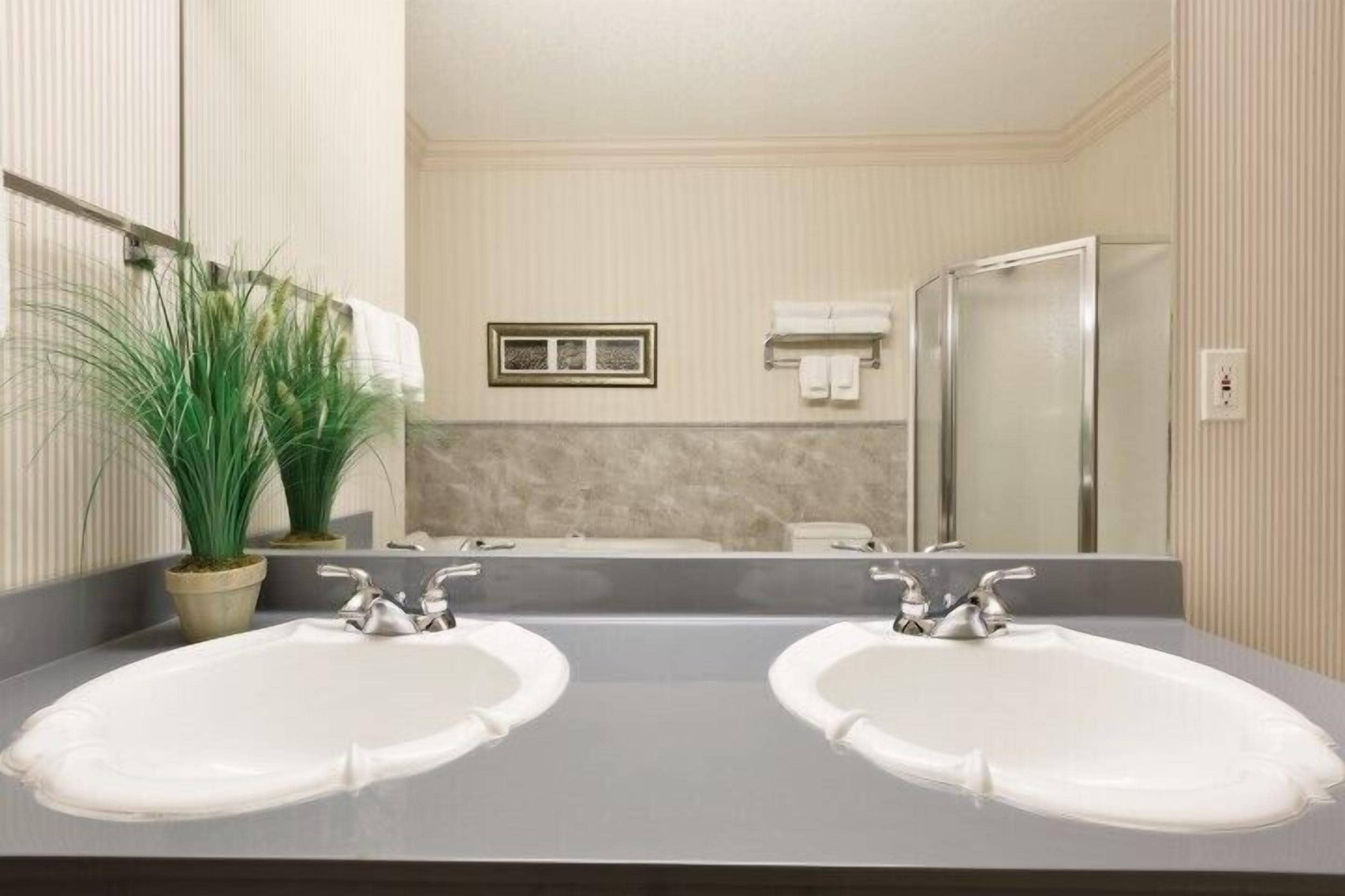 room, 1 king bed with sofa bed, non smoking (crown two room suite) | bathroom | combined shower/bathtub, free toiletries, hair dryer, towels