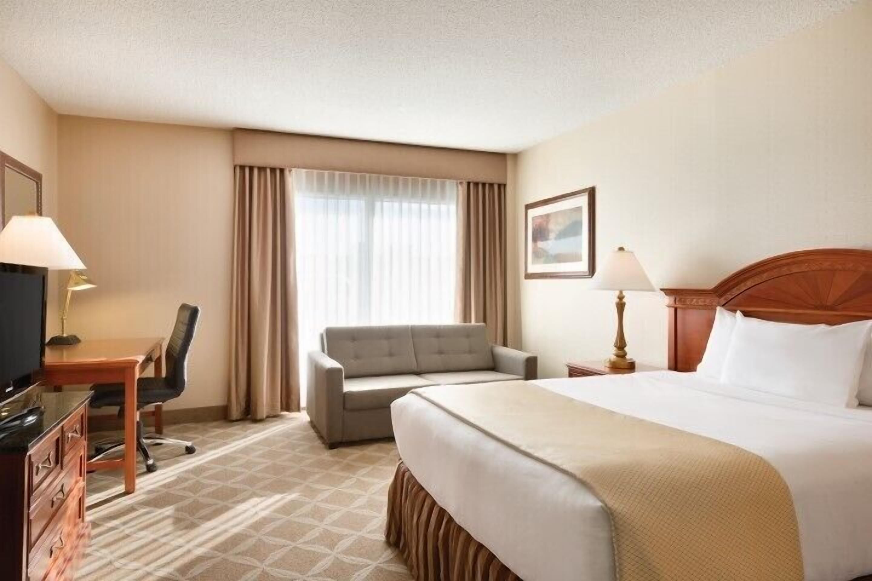 Pillow-top beds, desk, laptop workspace, blackout curtains