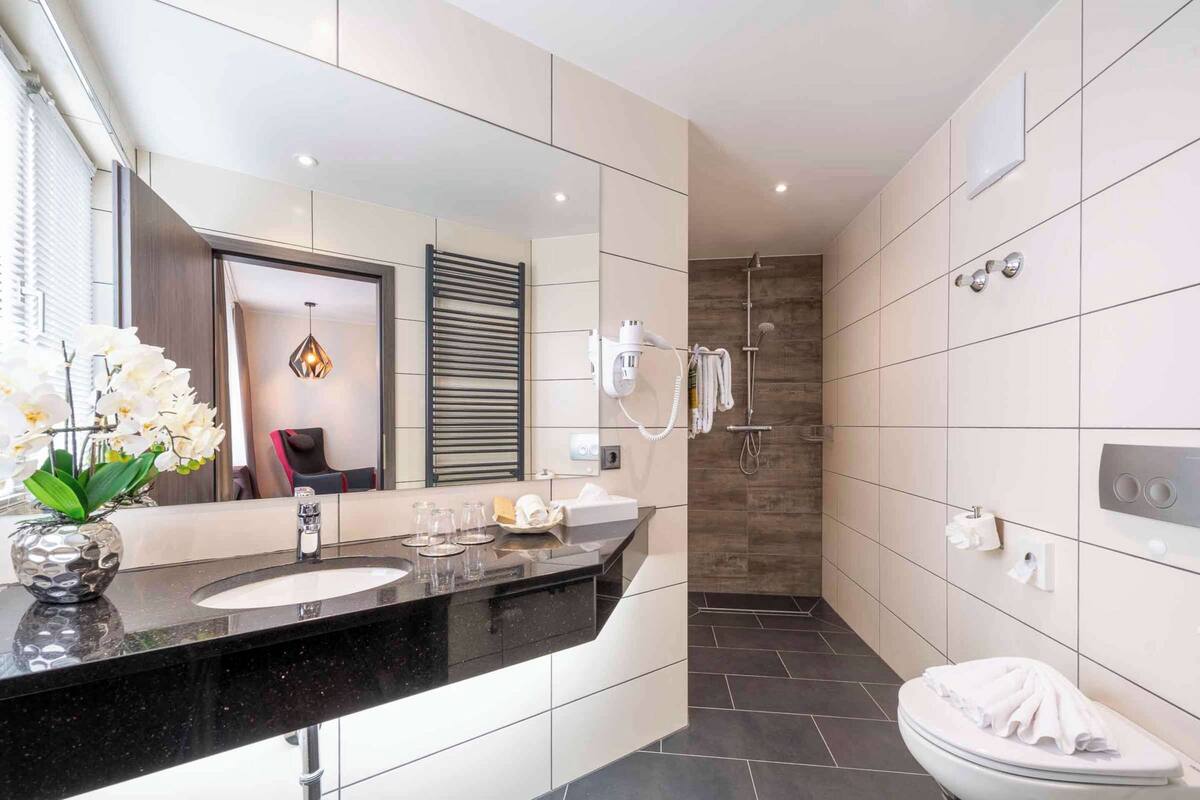 premium room, 3 single beds (cozy sitting corner) | minibar, in-room safe, desk, blackout curtains