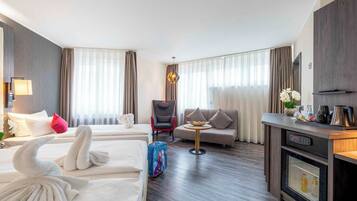 Premium Room, 3 Twin Beds (Cozy Sitting Corner) | Minibar, in-room safe, desk, blackout drapes