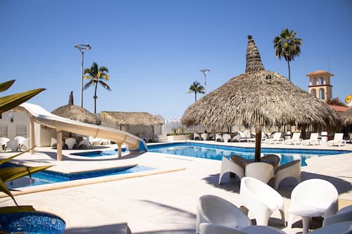 Outdoor pool, open 9:00 AM to 9:00 PM, sun loungers, lifeguards on site