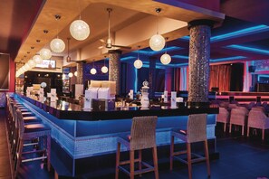 6 bars/lounges, 2 swim-up bars, 3 poolside bars
