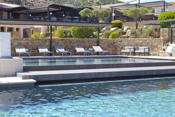 Indoor pool, 4 outdoor pools, open 9:00 AM to 8:00 PM, pool umbrellas