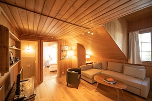 Romantic Condo | Living area | Flat-screen TV, DVD player