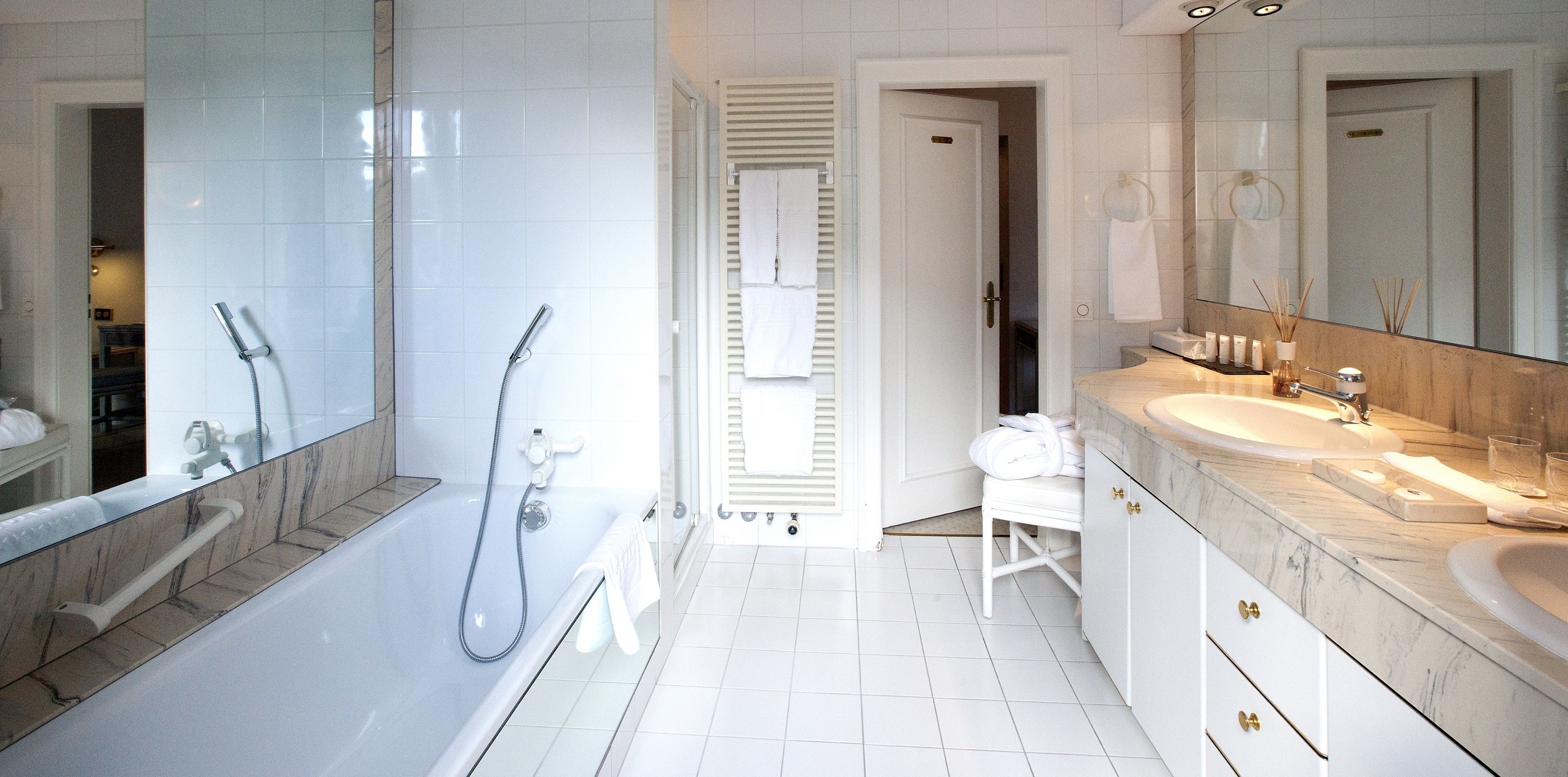 separate bathtub and shower, free toiletries, hair dryer, bathrobes