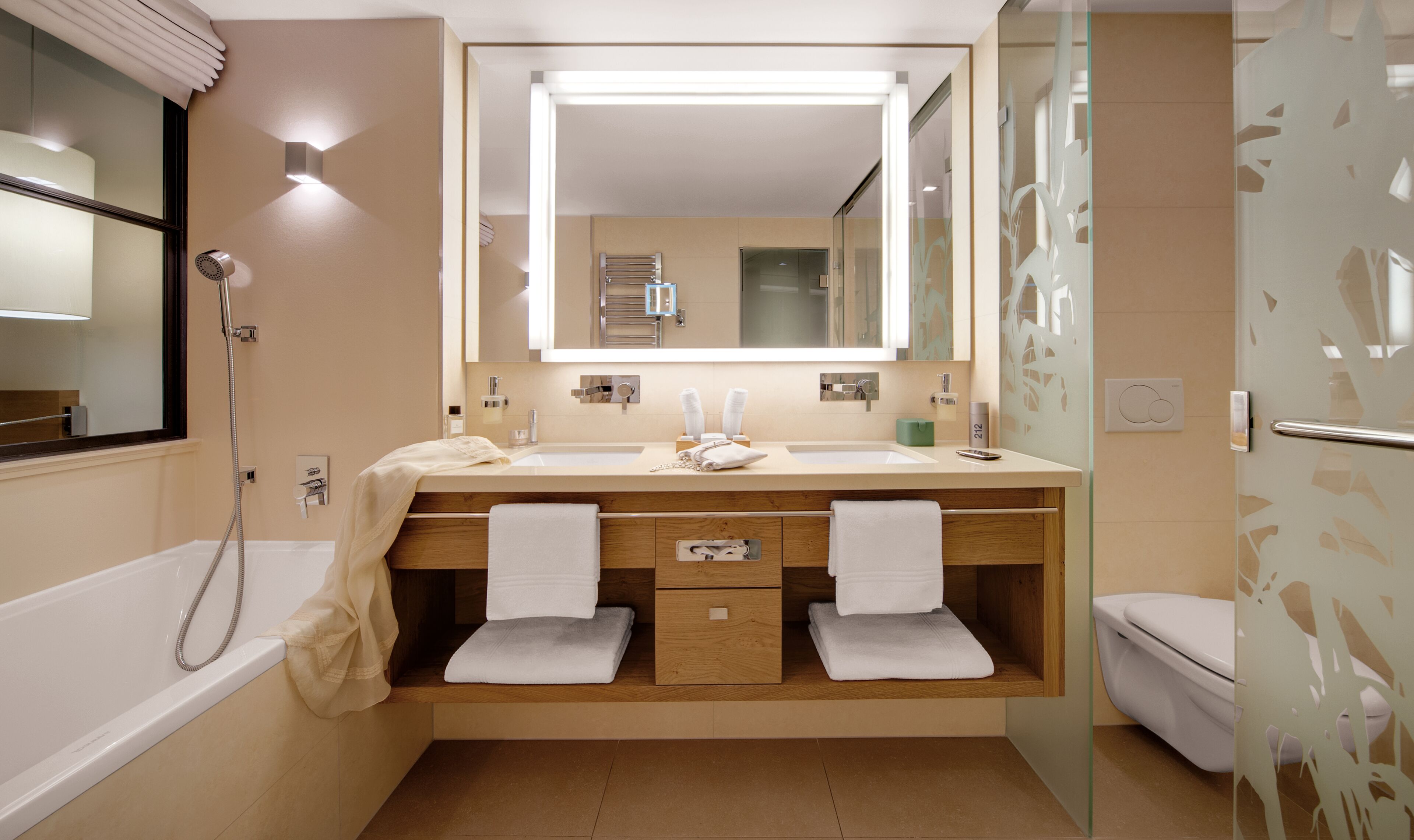 rainfall showerhead, designer toiletries, hair dryer, bathrobes