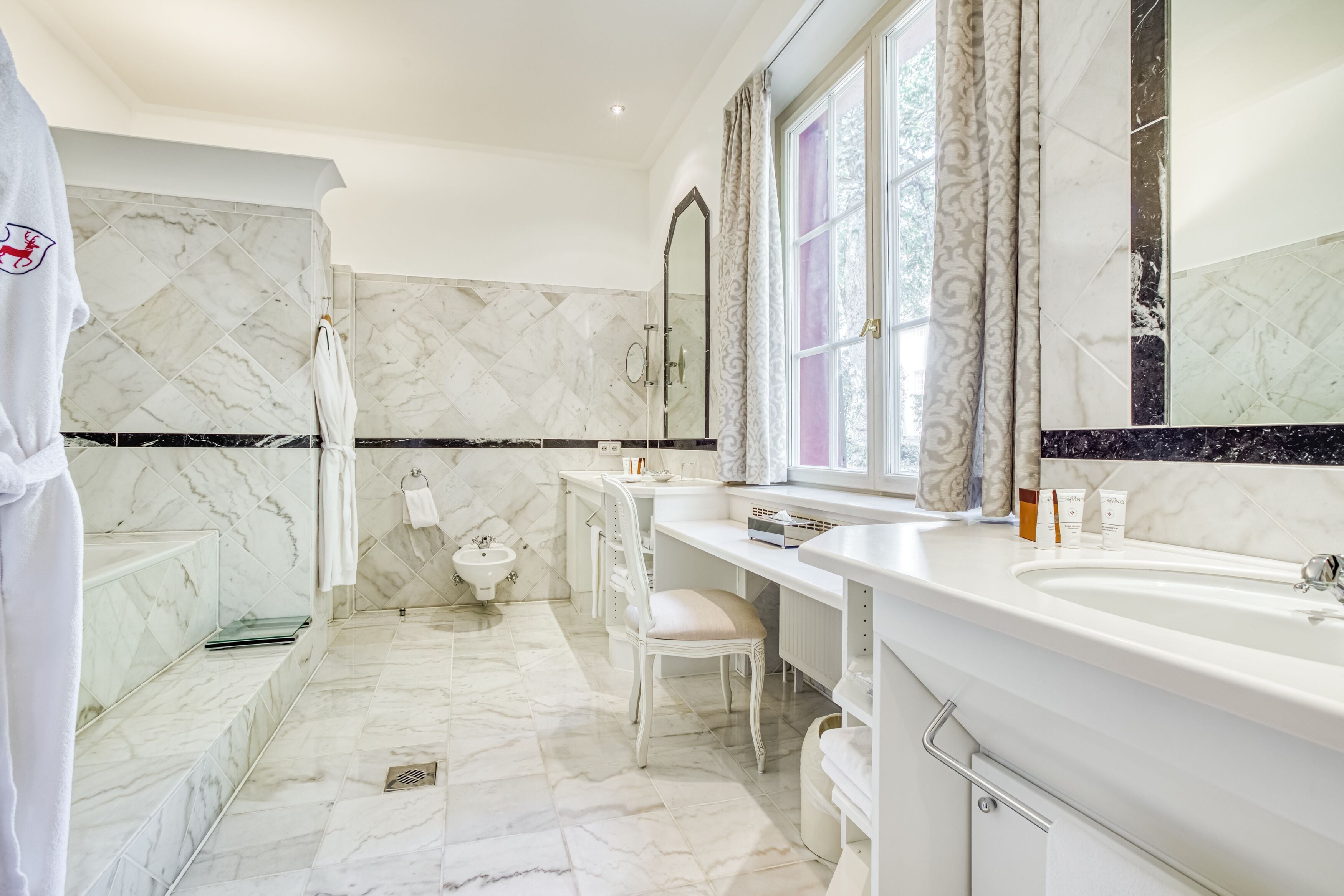 deluxe suite (torhaus) | bathroom | separate bathtub and shower, designer toiletries, hair dryer, bathrobes