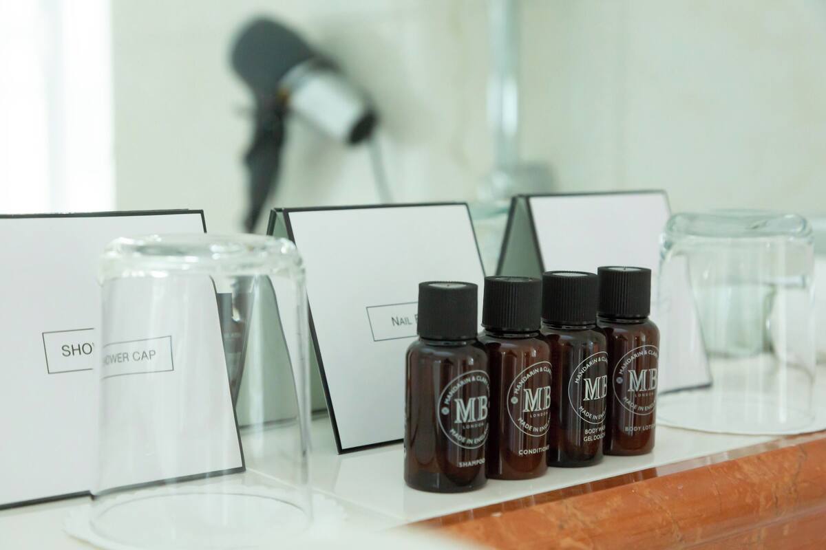 deluxe suite | bathroom | free toiletries, hair dryer, bathrobes, slippers