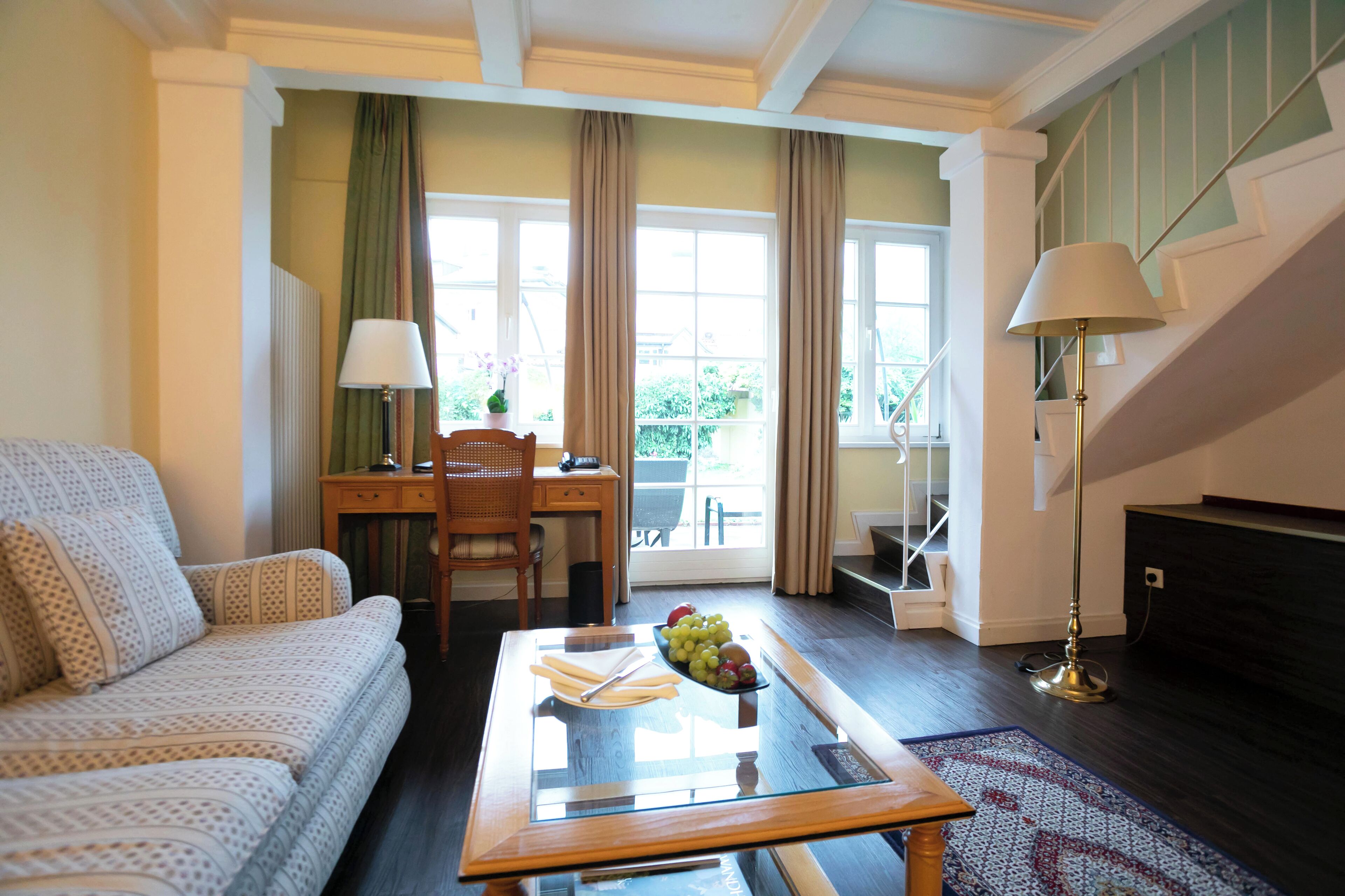 suite, patio, courtyard view | living area | 32-inch tv with satellite channels