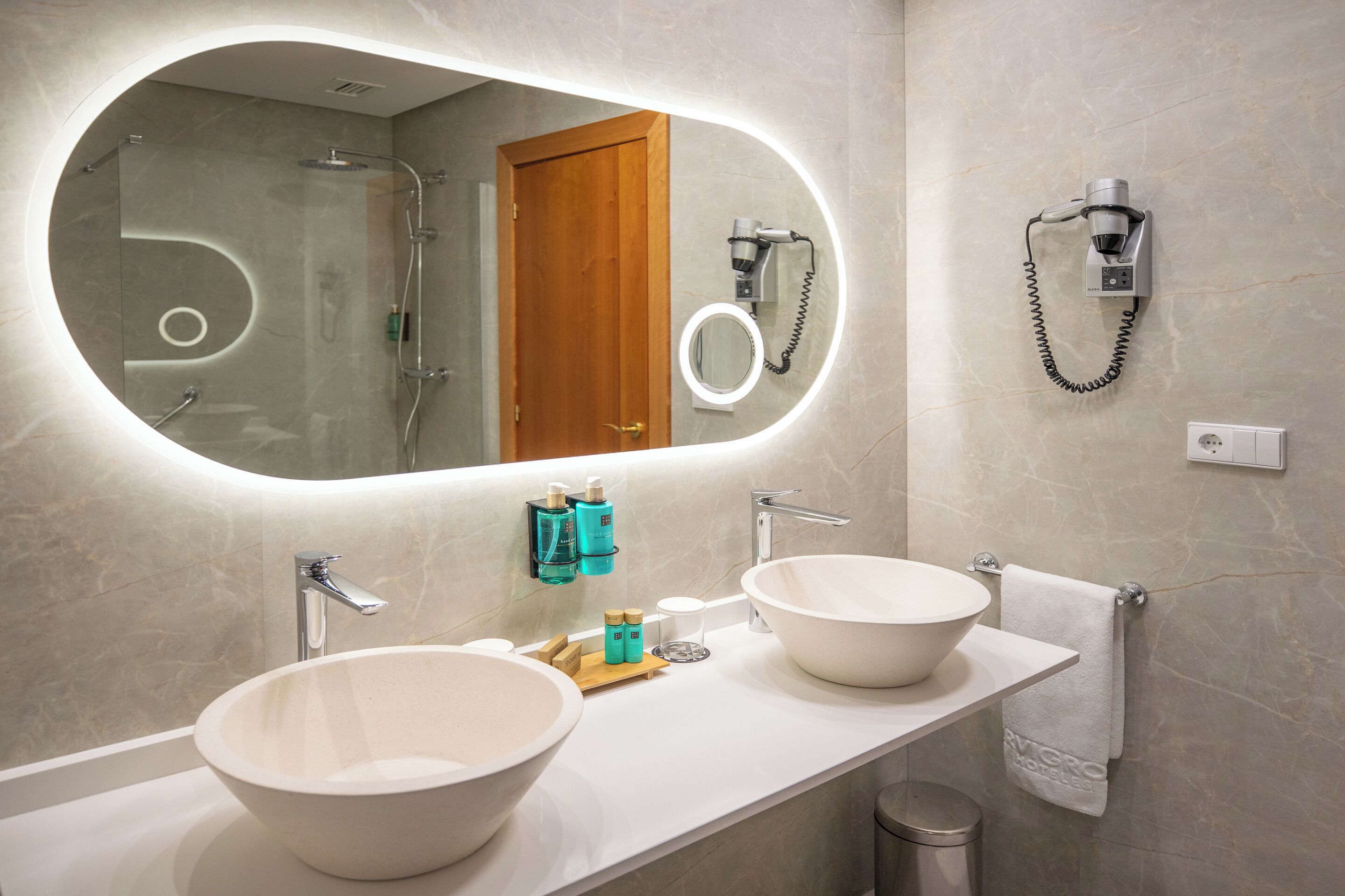 hair dryer, towels, soap, shampoo