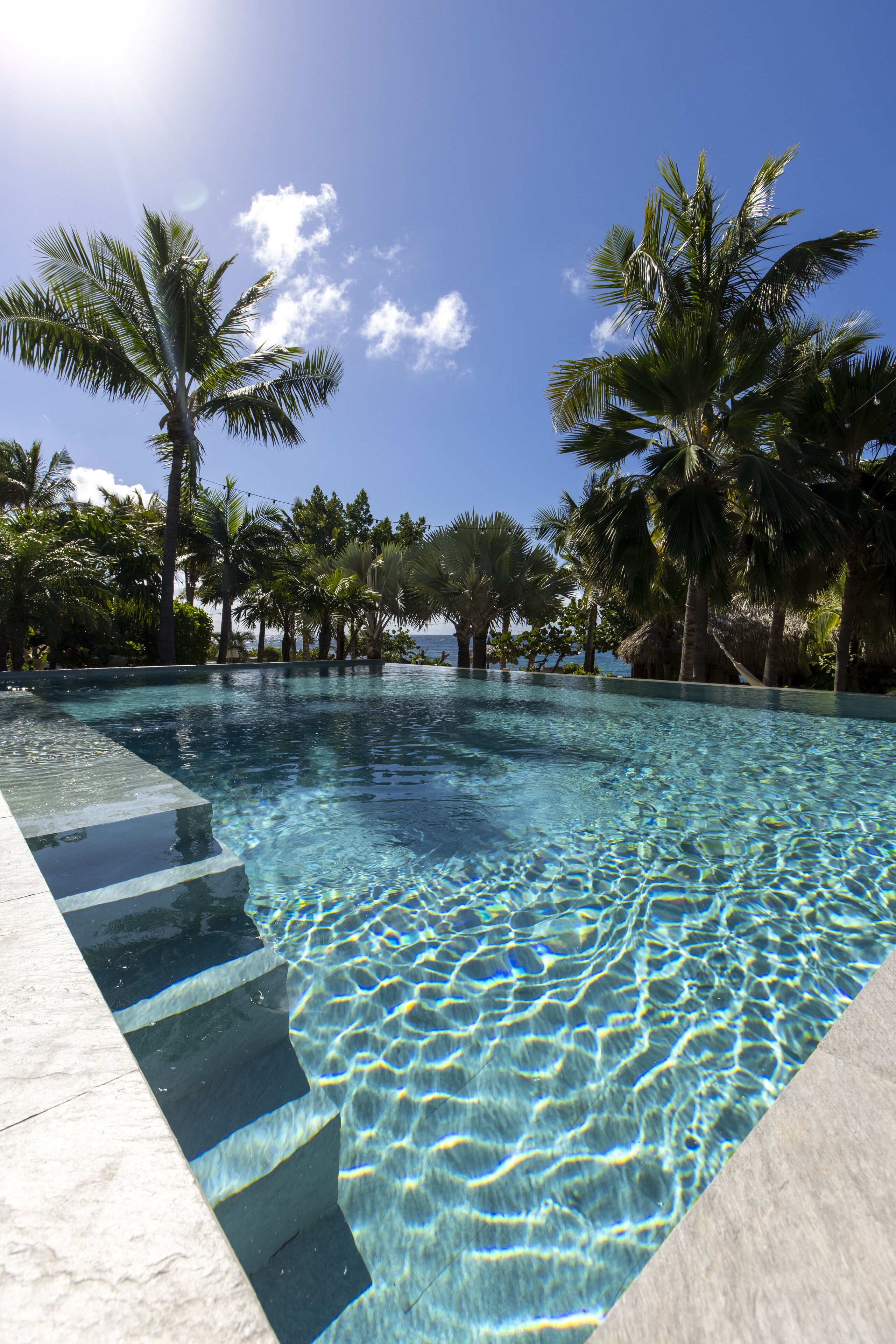 2 outdoor pools, pool umbrellas, pool loungers