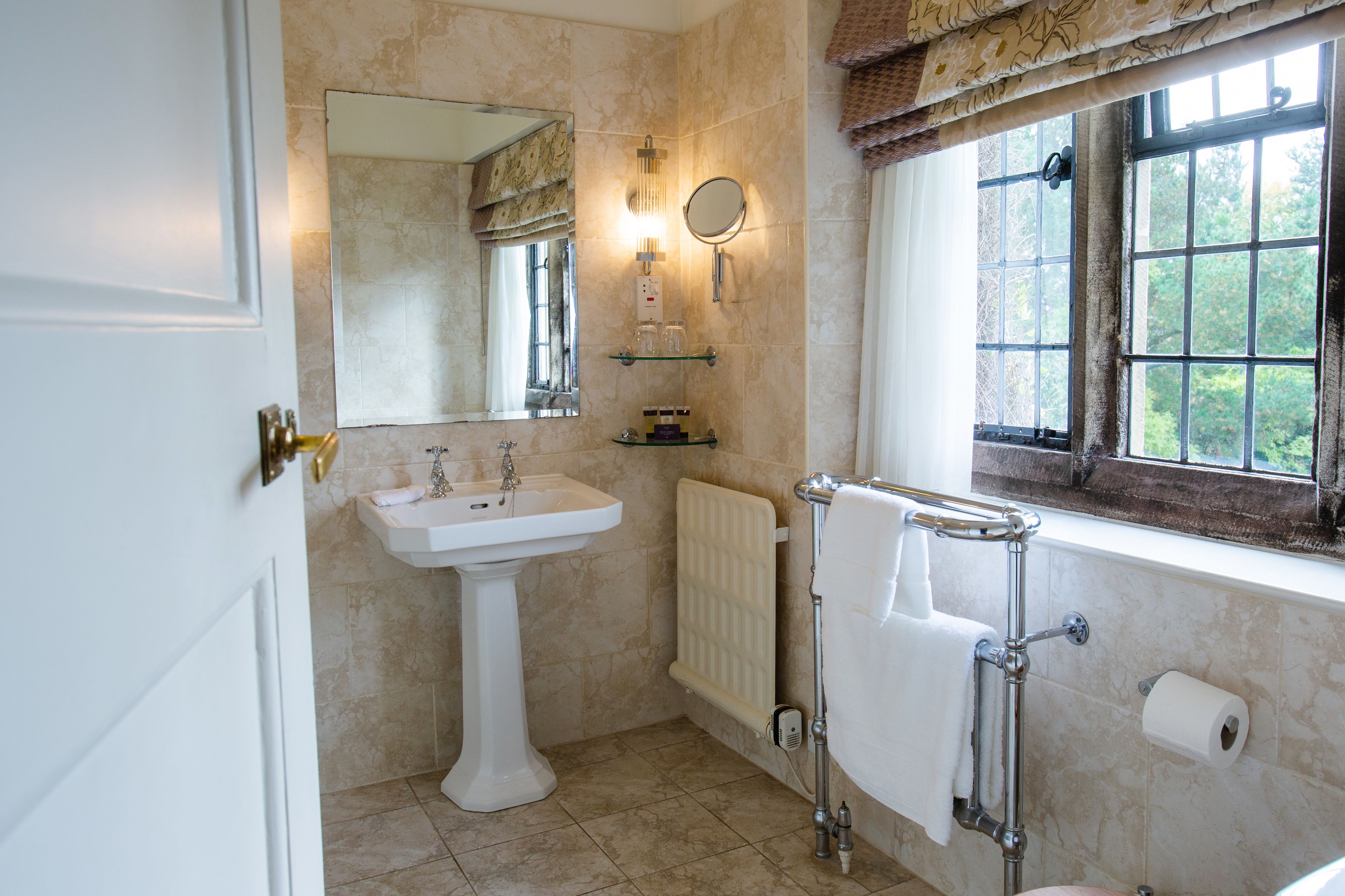 deluxe room | bathroom | shower, free toiletries, hair dryer, bathrobes
