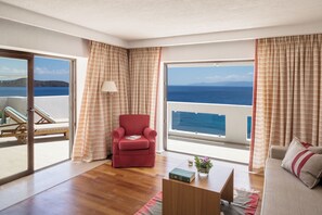 One Bedroom Superior Suite Sea View | Living area | 38-inch flat-screen TV with satellite channels, TV, DVD player