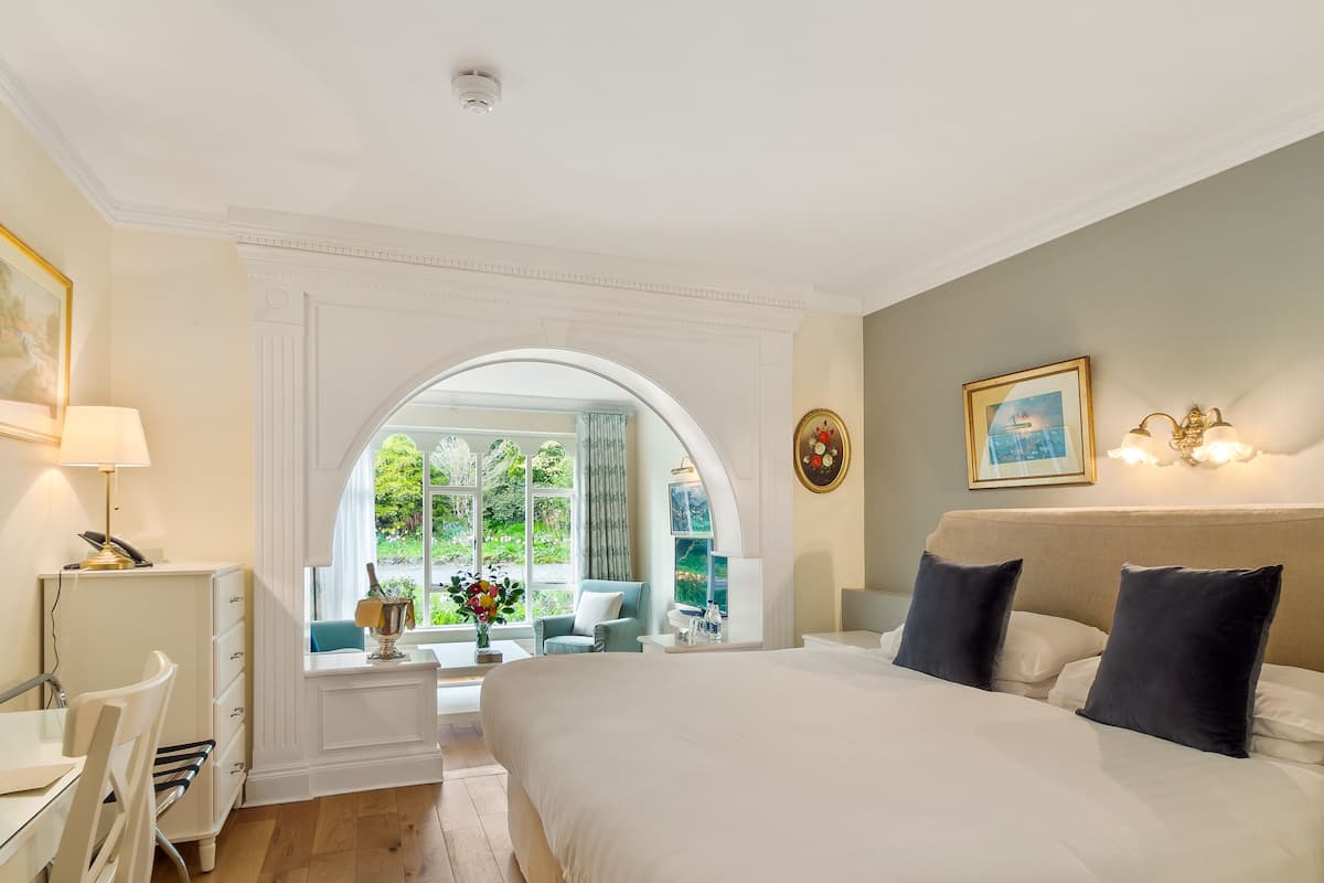 junior suite, 1 king bed, garden view, ground floor | 1 bedroom, hypo-allergenic bedding, individually decorated