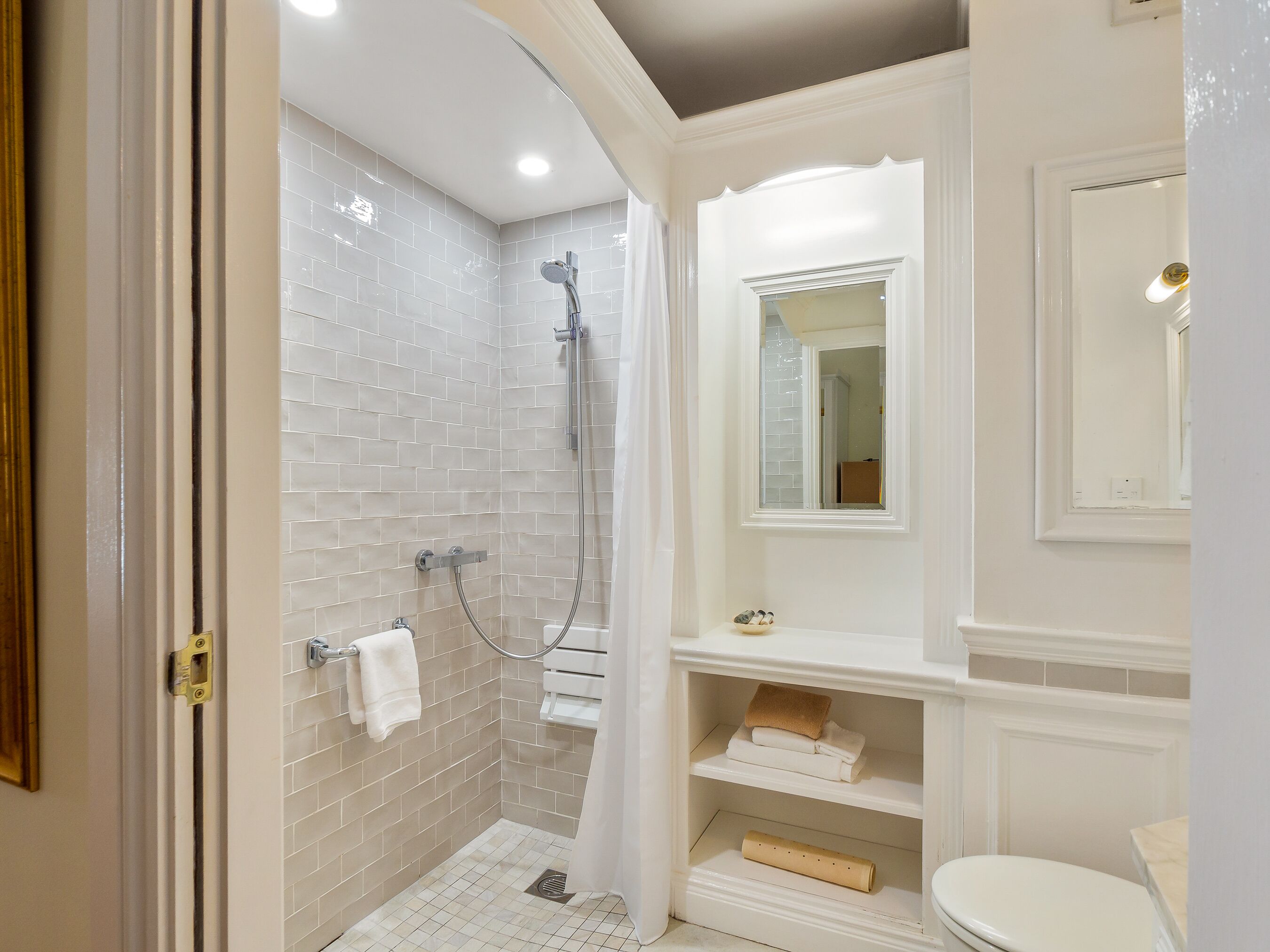 junior suite, 1 king bed, garden view, ground floor | bathroom | designer toiletries, hair dryer, towels, soap