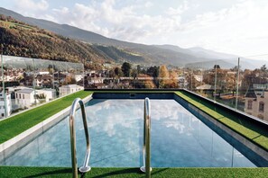 Indoor pool, outdoor pool, open 7 AM to 8 PM, pool loungers