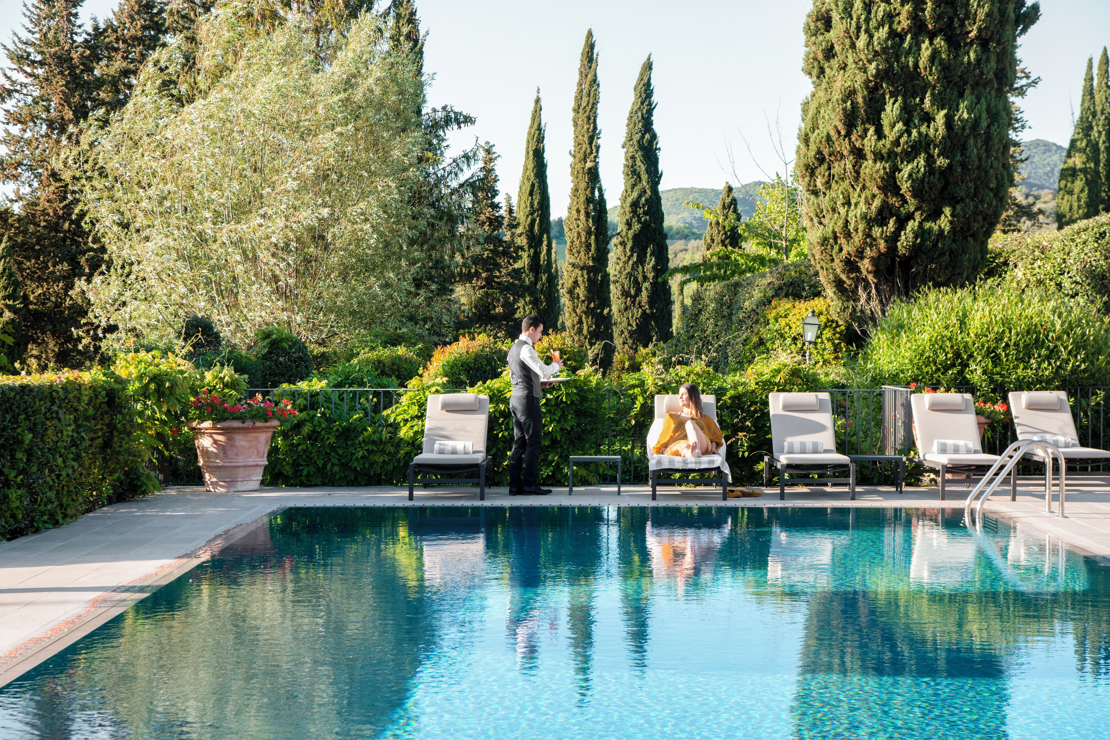 Seasonal outdoor pool, free pool cabanas, pool umbrellas