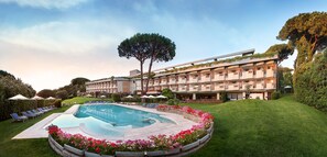 Outdoor pool, pool umbrellas, pool loungers