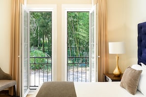 Room, Garden Area | Minibar, in-room safe, desk, blackout curtains