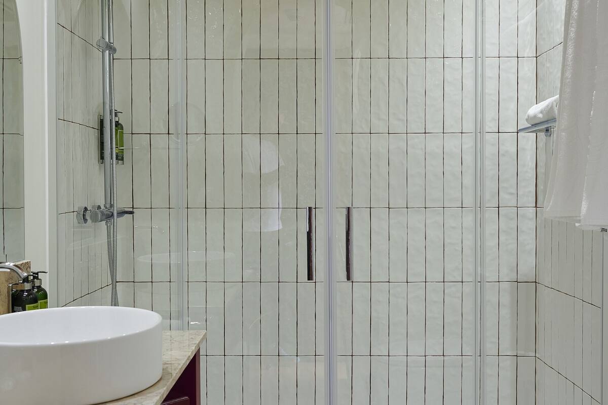 bathtub, free toiletries, hair dryer, bathrobes