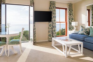 Premier Suite | Living area | 43-inch Smart TV with satellite channels, TV - The Plettenberg Hotel (Plettenberg Bay)