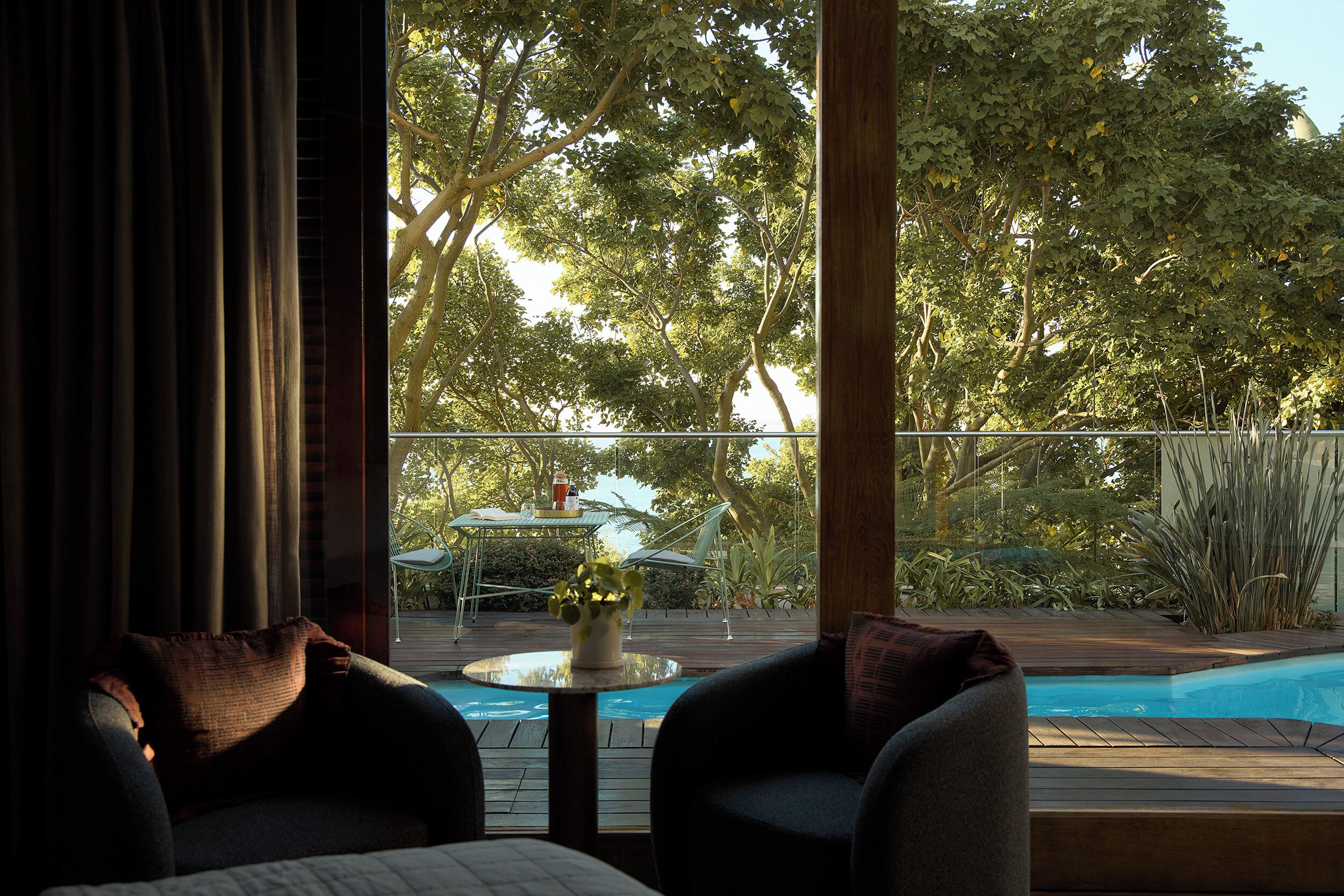 Deluxe Room (SPA) | Living area | LCD TV, DVD player, heated floors