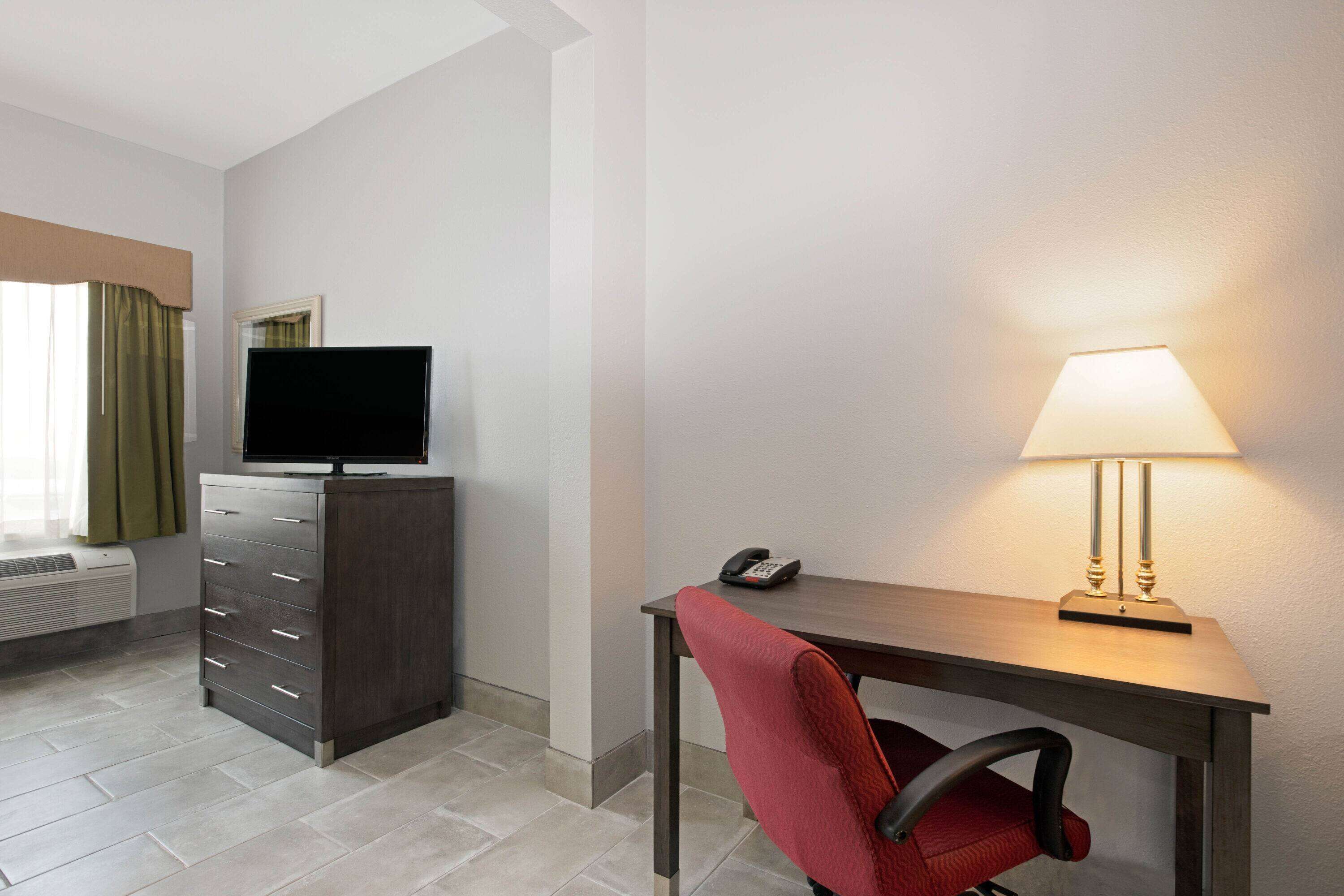 premium bedding, desk, laptop workspace, iron/ironing board