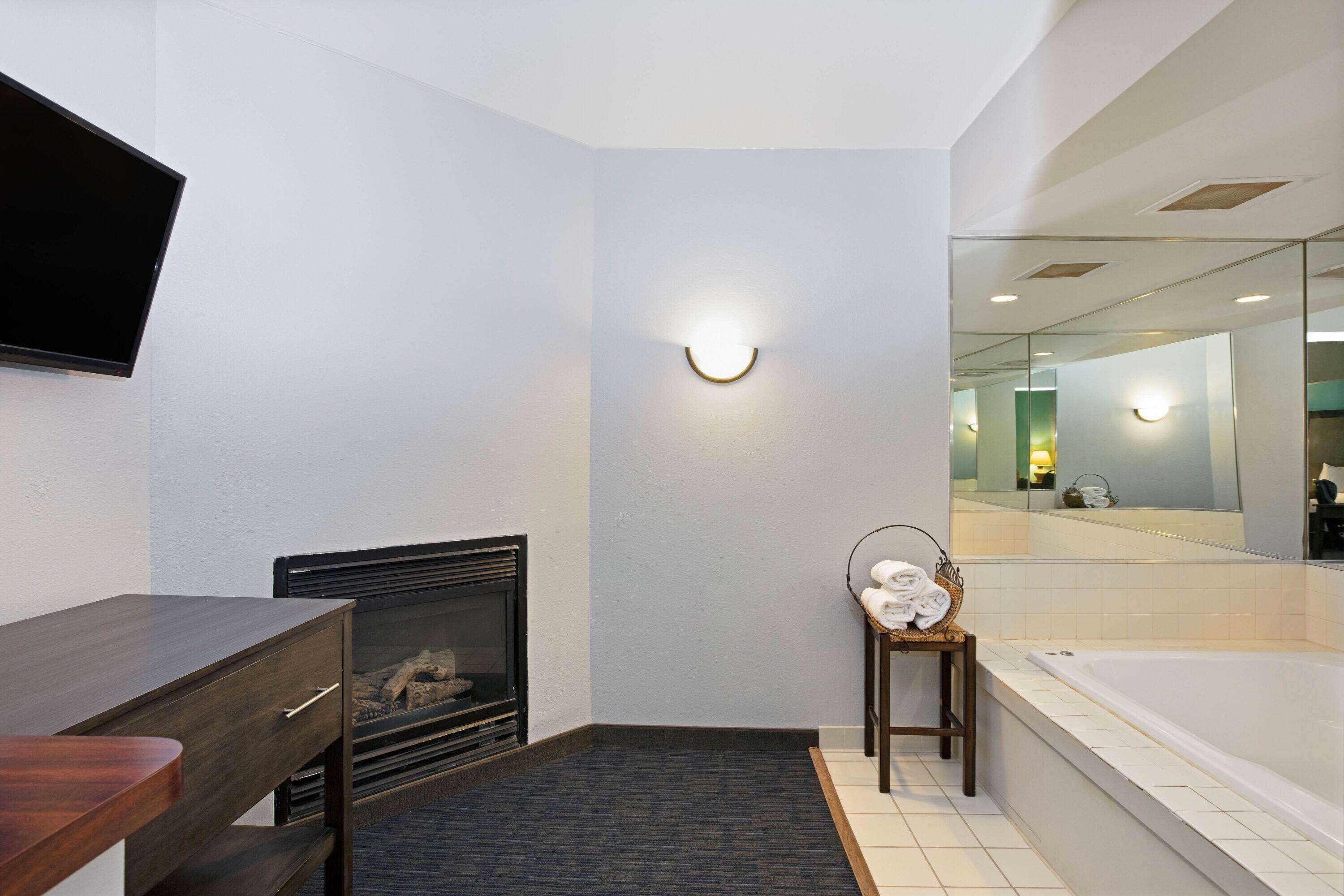 premium bedding, desk, laptop workspace, iron/ironing board