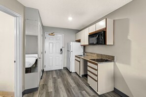 Fridge, microwave, stovetop, coffee/tea maker